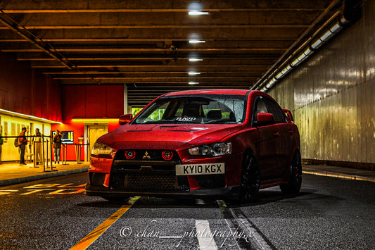 Red Mitsubishi Lancer owned by Tyrell